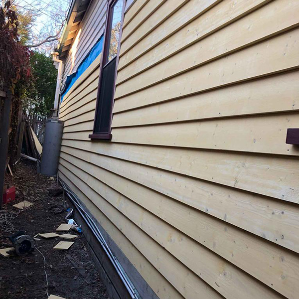 Weatherboards replaced on side of house St Kilda